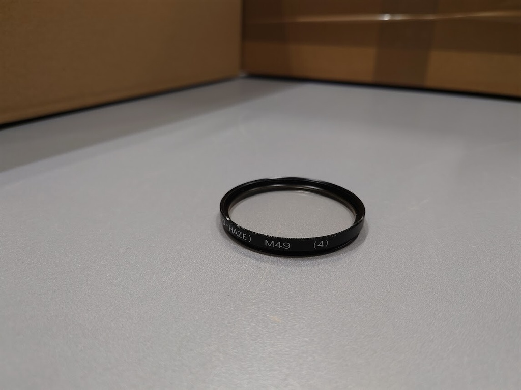 Unknown, UV 390 (0-Haze) M49 (4) Lens Filter Used