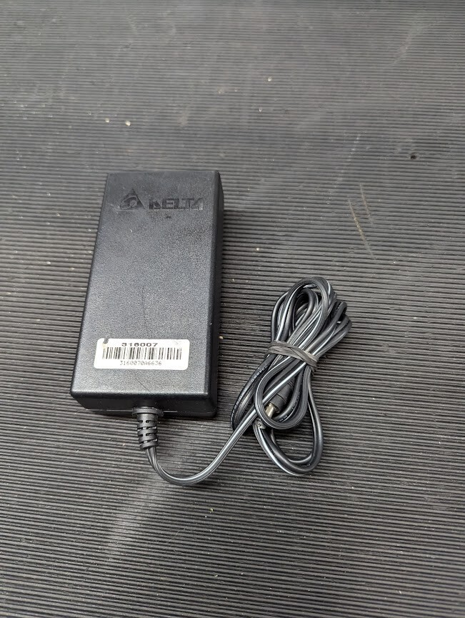 DELTA AMD-24V060W3AA  AC Adapter 24V 2.5A Without Power Cord Black Used