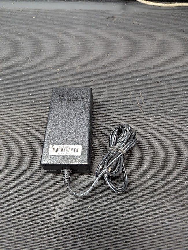 DELTA AMD-24V060W3AA  AC Adapter 24V 2.5A Without Power Cord Black Used