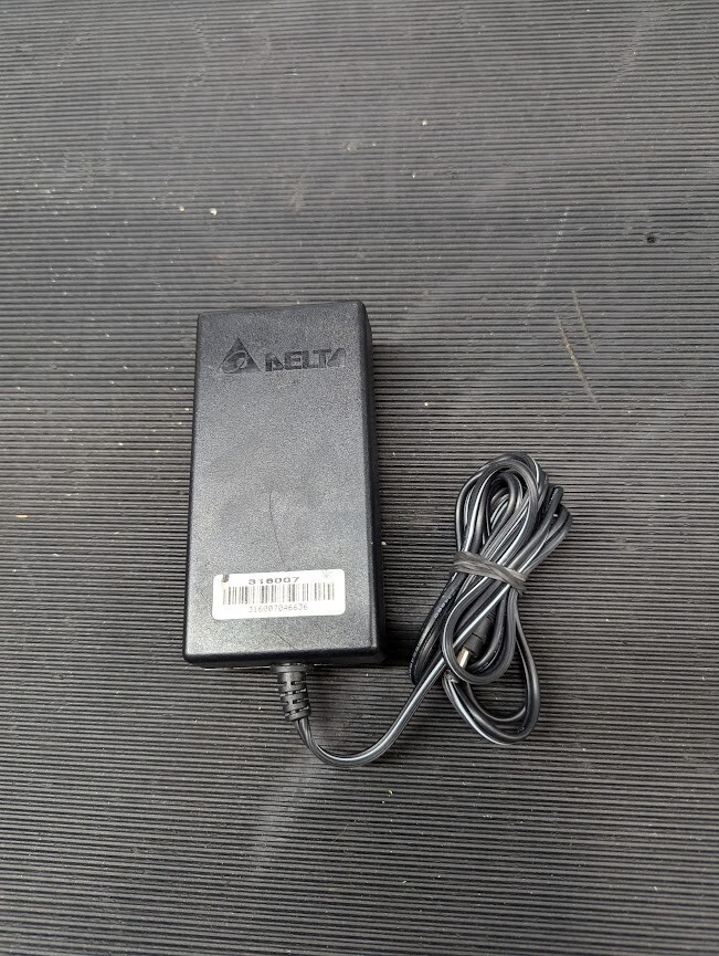 DELTA AMD-24V060W3AA  AC Adapter 24V 2.5A Without Power Cord Black Used