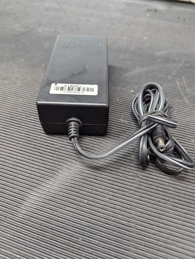 DELTA AMD-24V060W3AA  AC Adapter 24V 2.5A Without Power Cord Black Used