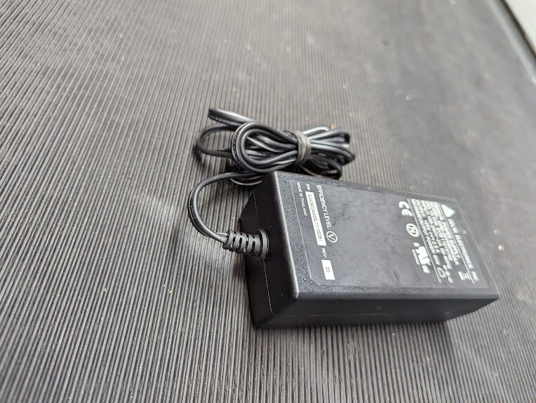 DELTA AMD-24V060W3AA  AC Adapter 24V 2.5A Without Power Cord Black Used