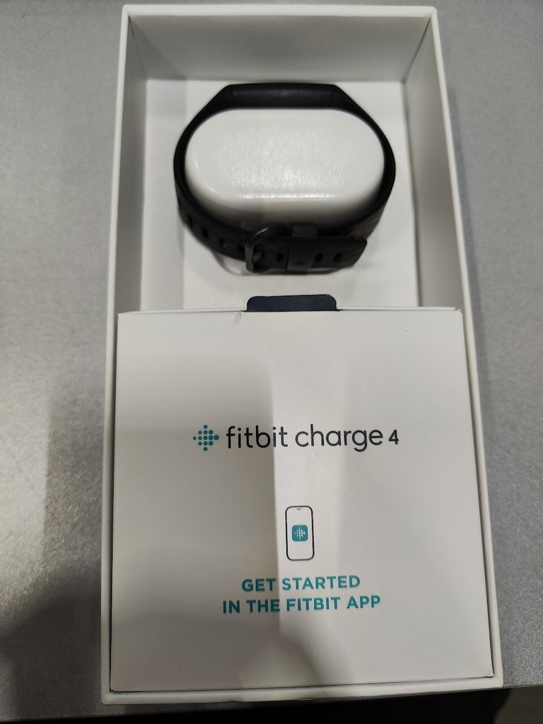 Fitbit Charge 4 Used And Not Functional Smartwatch + Health Watch For Parts