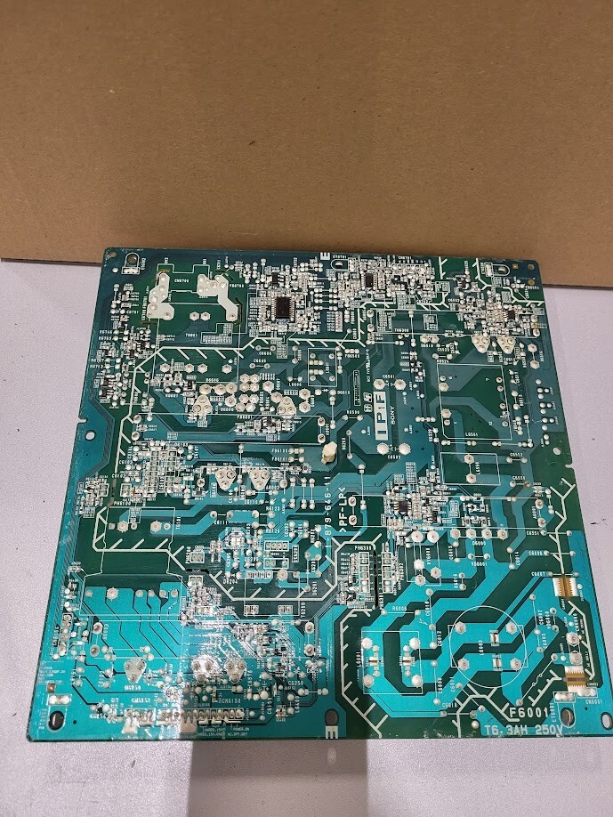 Power Supply Board with F6001 T6.3AH 250V Fuse & Coil Assembly – Parts Untested