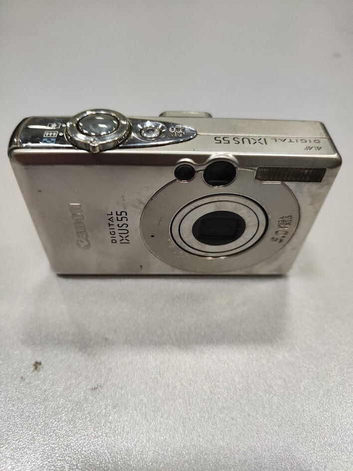 Cámara digital Canon IXUS 55 5,0 MP 3x zoom óptico plateado no funciona