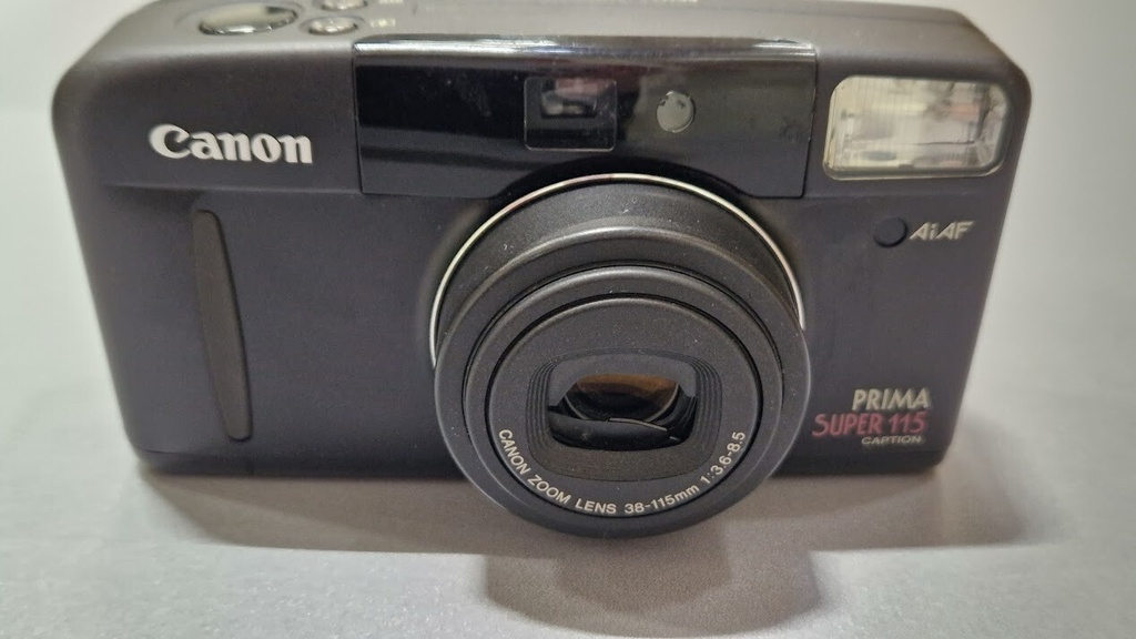 Canon Prima Super 115 Film Camera Zoom Lens 38-115mm For Parts Not Working
